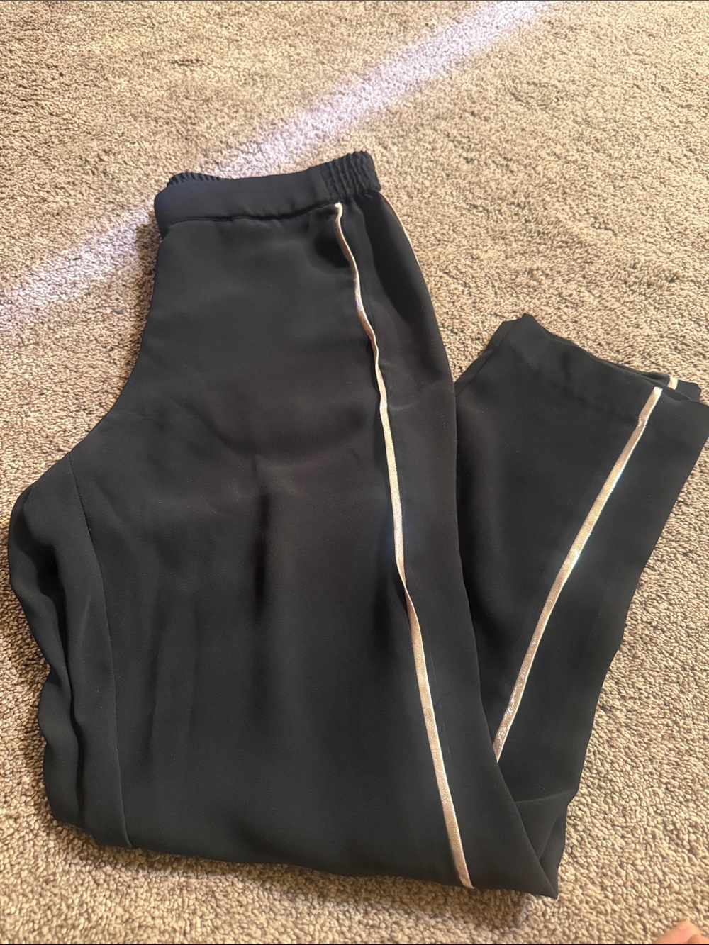 1. State Black Jumpsuit with Gold Side Piping